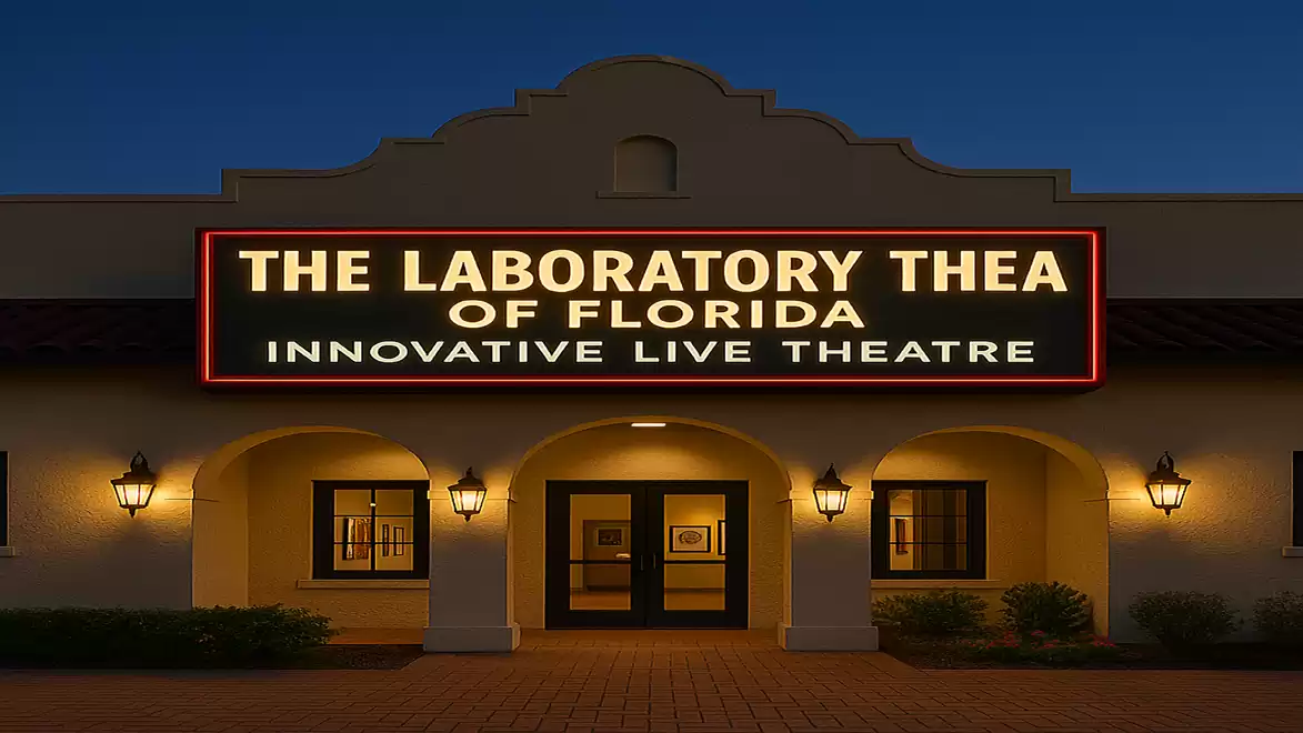 Night view of a theater in Florida with a lit sign 'The Laboratory Theatre of Florida'.