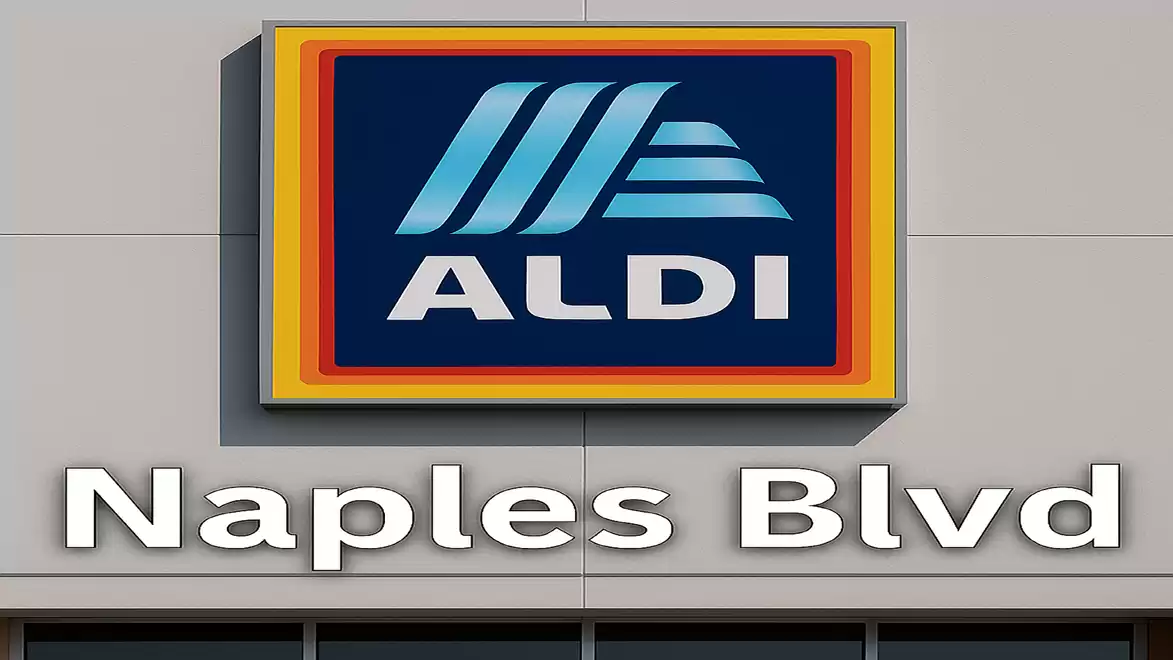 ALDI logo on a building with the text Naples Blvd, taken in daylight.