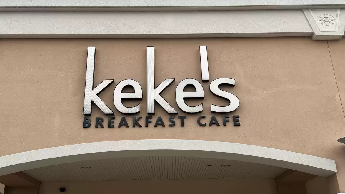 Entrance sign of Keke's Breakfast Cafe with modern lettering.