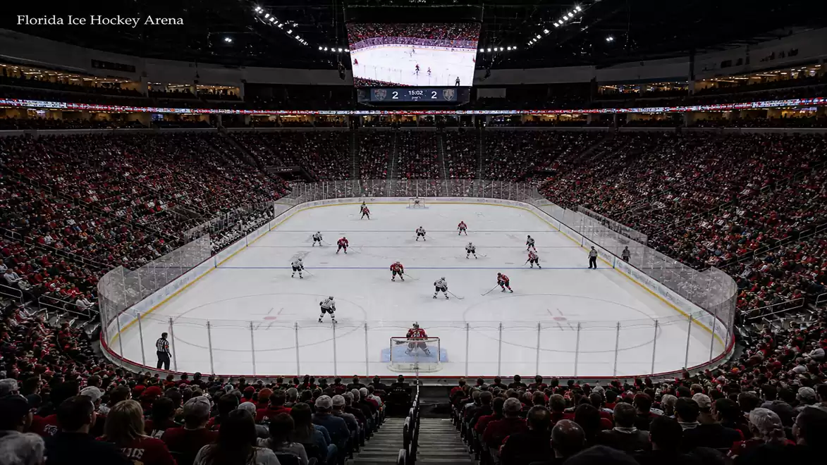 Full ice hockey arena with two teams playing, spectators in the stands.