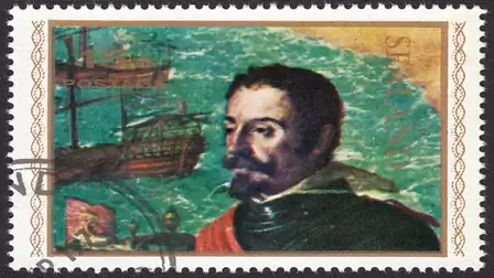 Postage stamp featuring a portrait of a man in historical clothing with a sailing ship in the background.