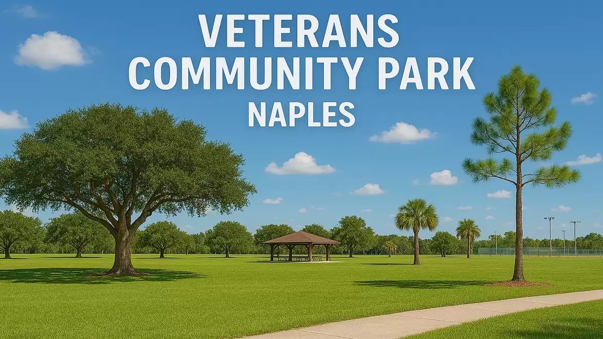 A vast green park with a pavilion and various trees under a clear blue sky. The text on the image reads: 'Veterans Community Park, Naples'.