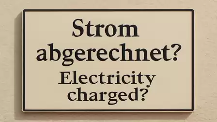 Sign reading 'Strom abgerechnet? Electricity charged?' on a wall.