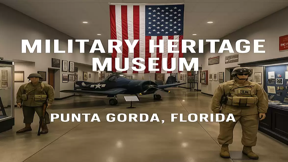 Interior view of the Military Heritage Museum in Punta Gorda, Florida, featuring an American flag, a historic aircraft, and two military figures.