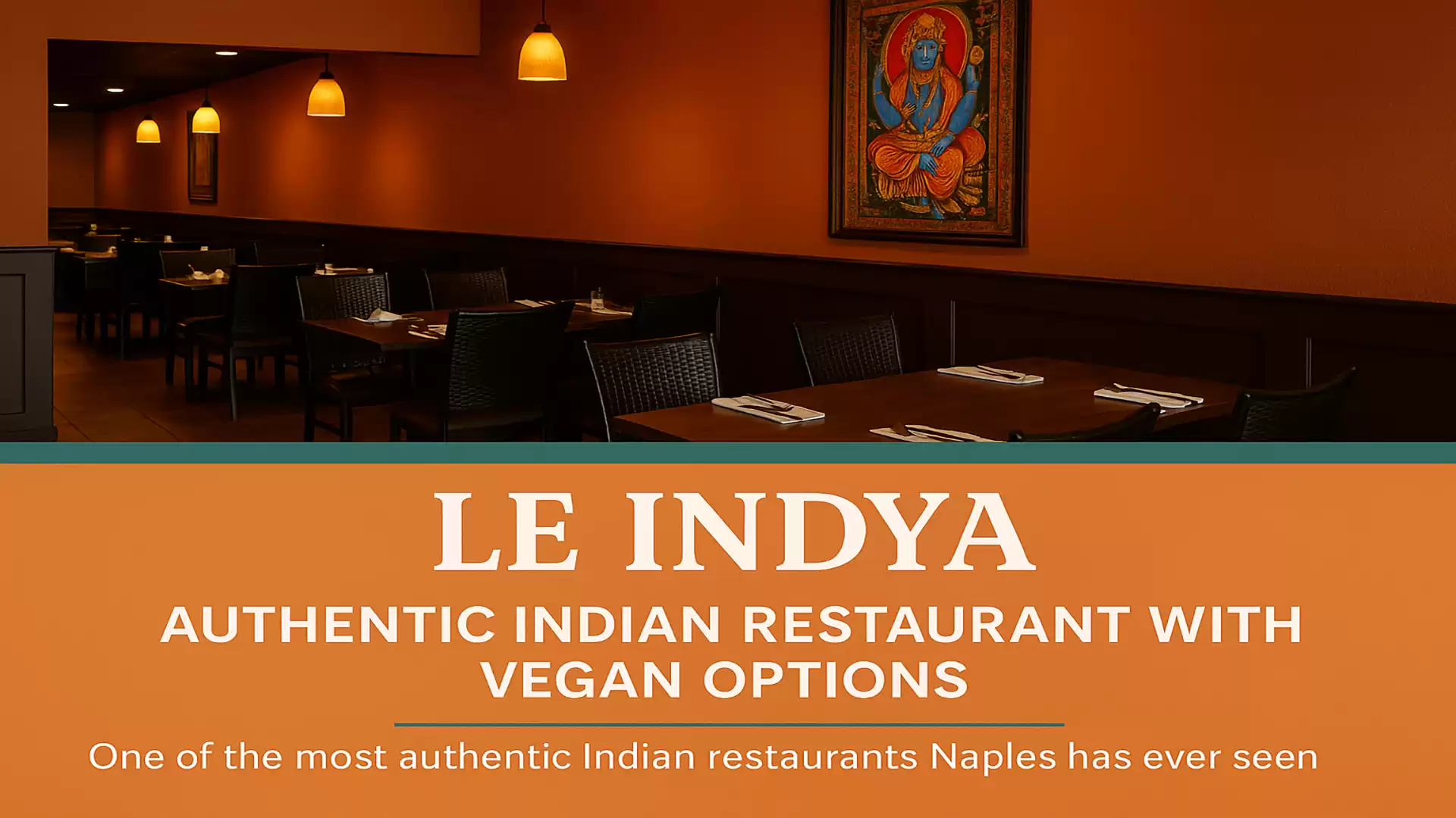 Interior view of an authentic Indian restaurant with vegan options. The warm orange tones and Indian art create an inviting atmosphere.