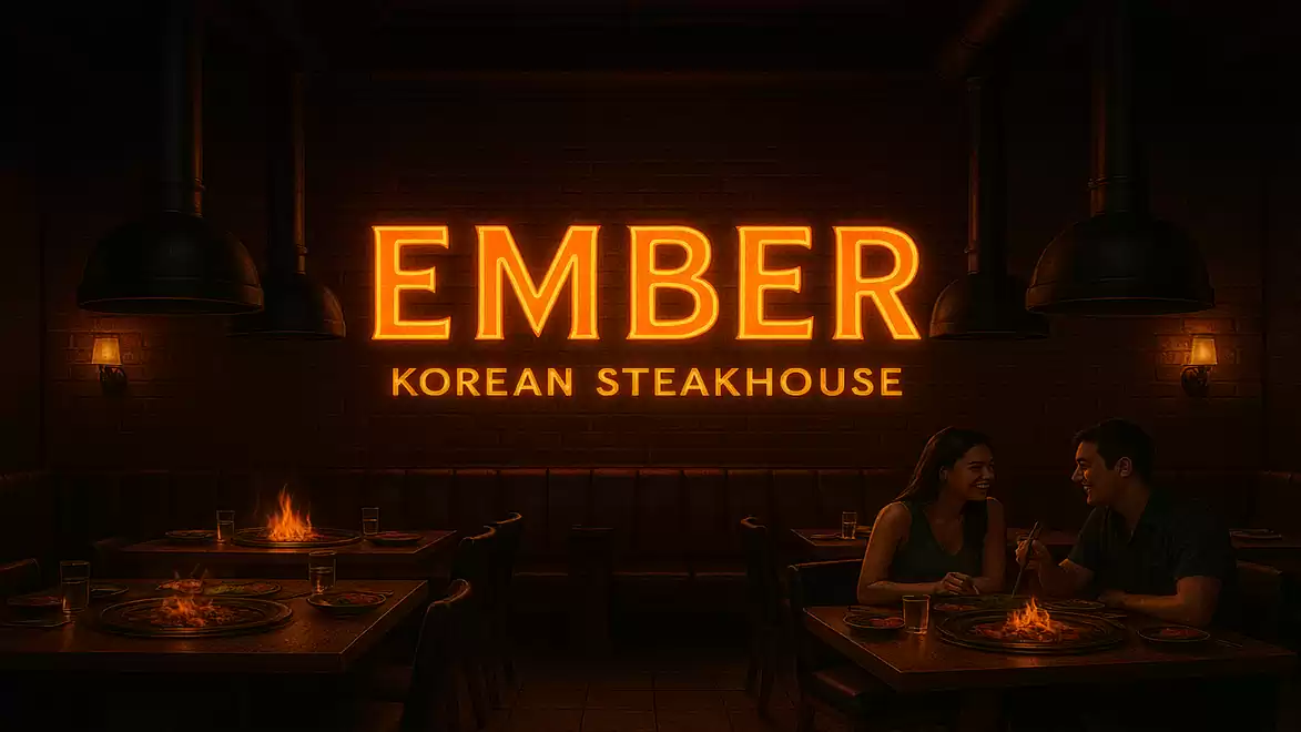 Dark restaurant with bright orange sign Ember Korean Steakhouse, a couple sitting at a table with flickering flame.
