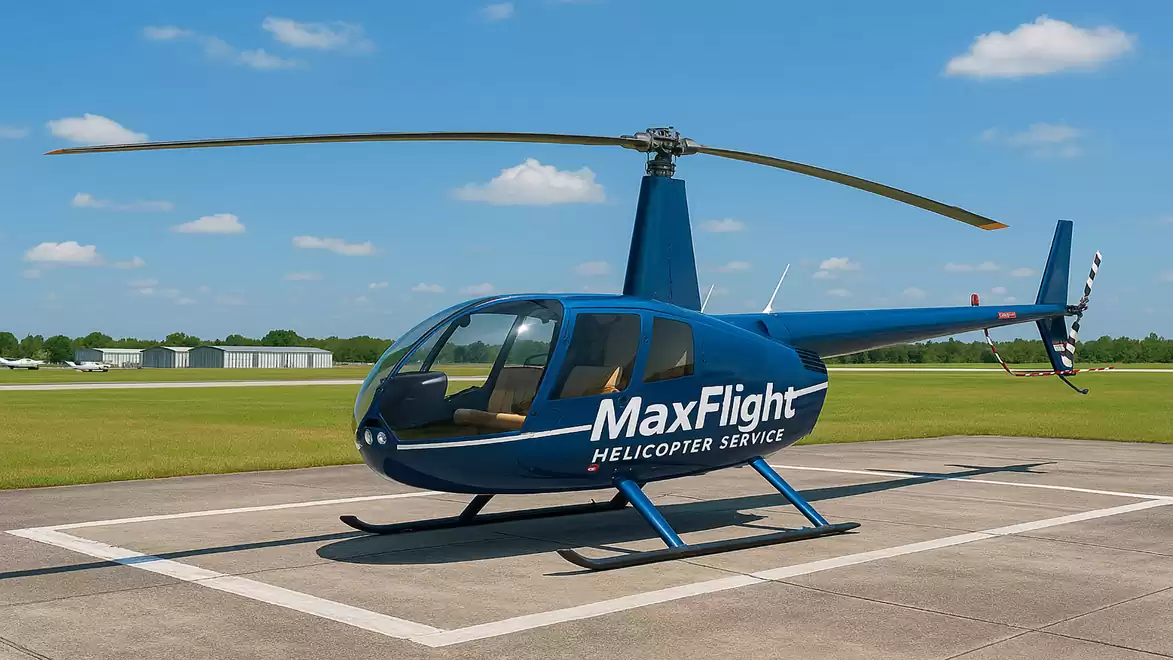 Blue helicopter on airport taxiway under blue sky.