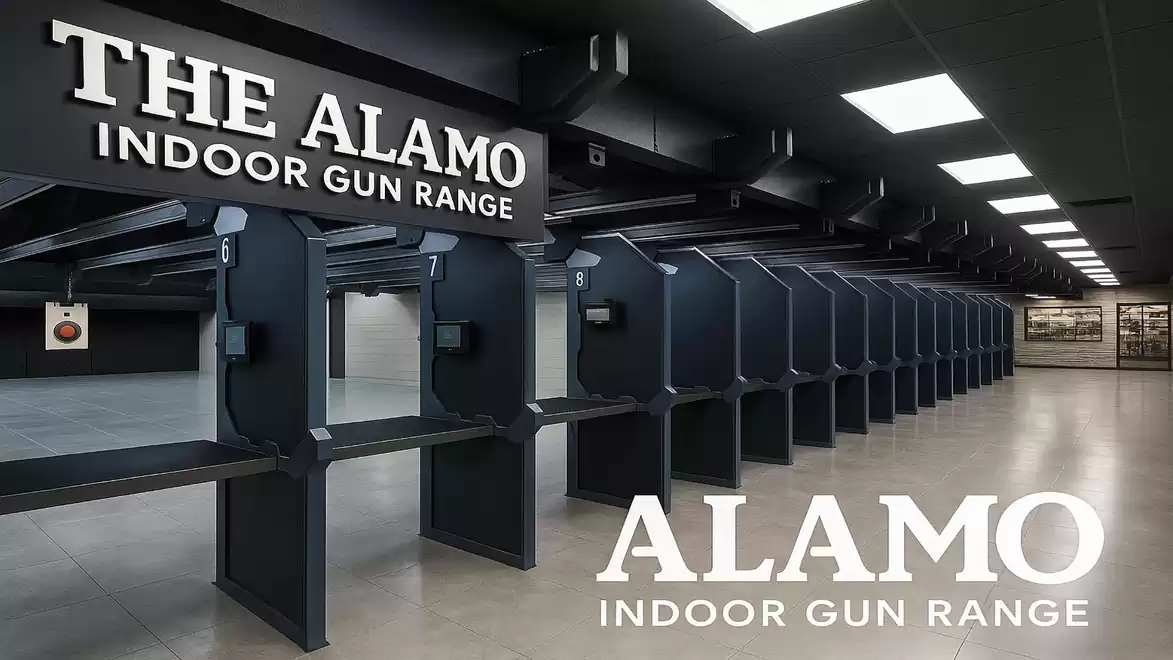 A modern, spacious indoor shooting range with multiple shooting stalls and illuminated targets.