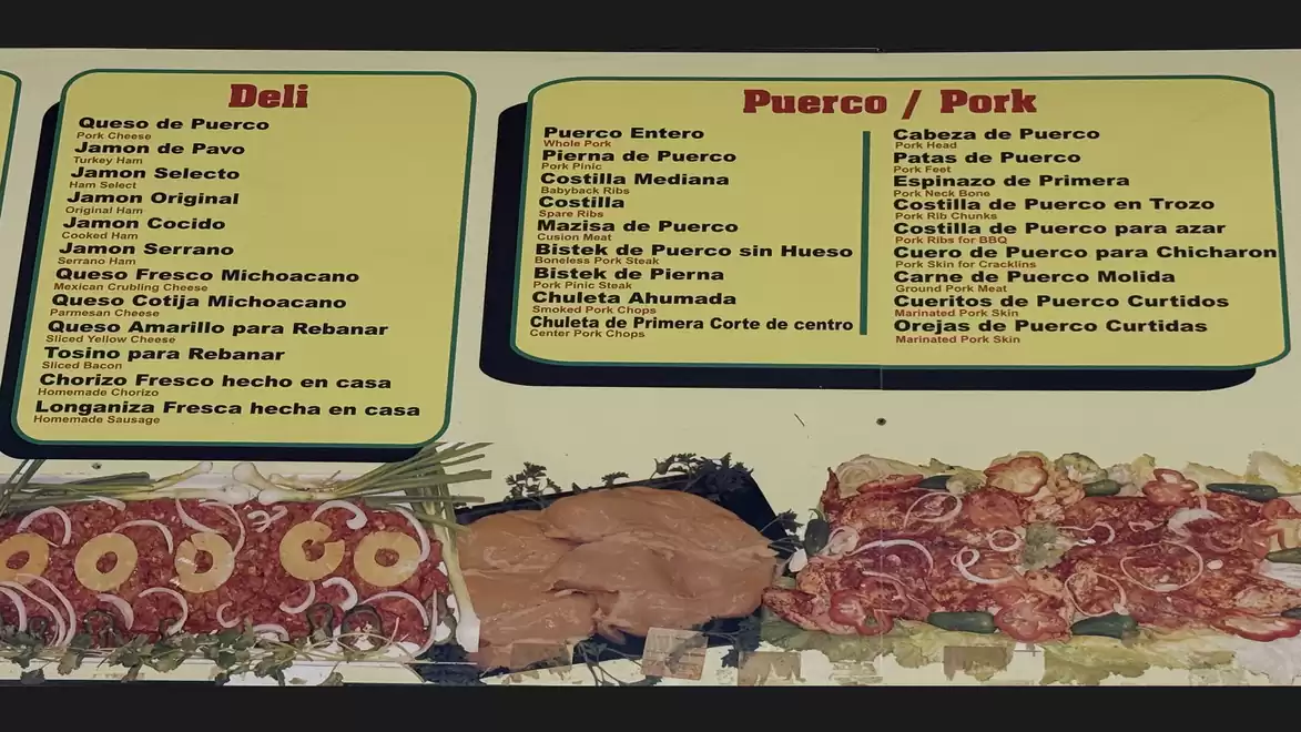 Menu with deli and pork specialties showcasing Mexican sausage and meat varieties.