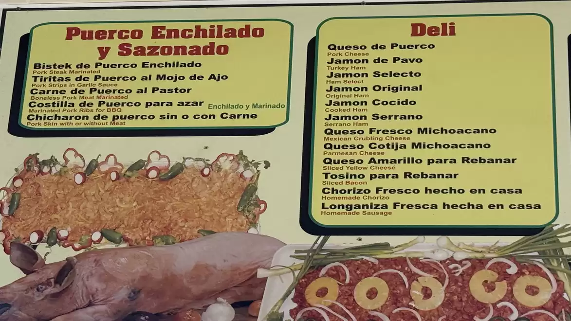 Image of a menu featuring Mexican pork dishes and delicacies, including Puerco Enchilado and various cheeses.