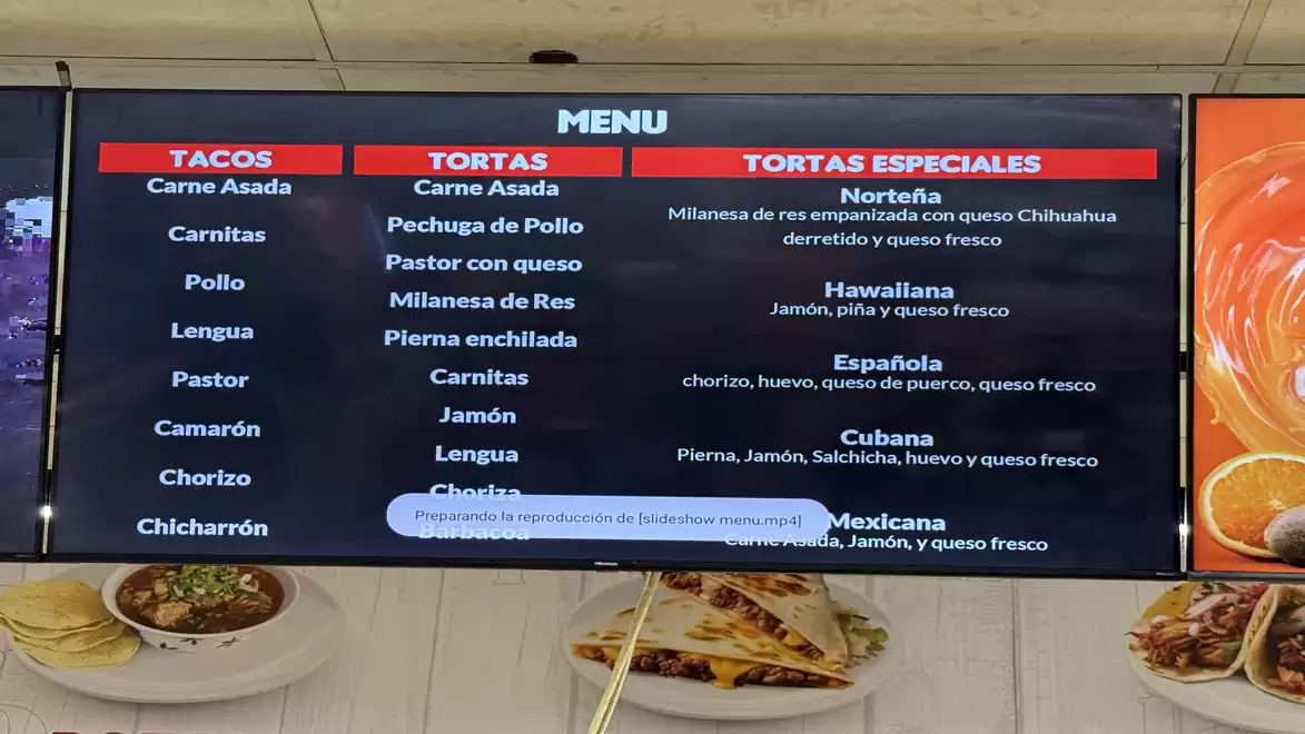Restaurant menu featuring various options such as Tacos, Tortas, and Tortas Especiales. Taco options include Carne Asada and Pastor con queso. Tortas offerings include Pechuga de Pollo and Jamón. The Tortas Especiales feature variations like Norteña and H