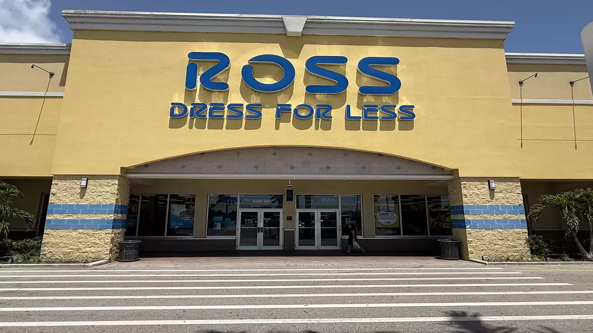 Exterior view of a Ross Dress for Less store with a yellow facade and blue signage.
