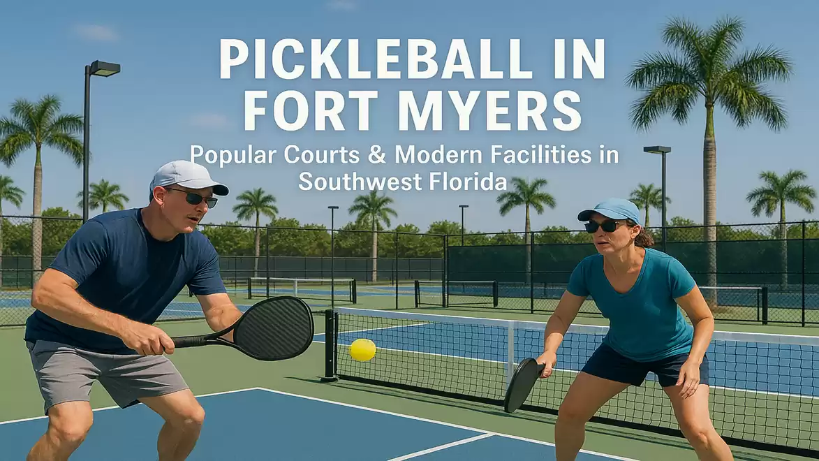 Two people playing pickleball on a court in Fort Myers, surrounded by palm trees and modern facilities.