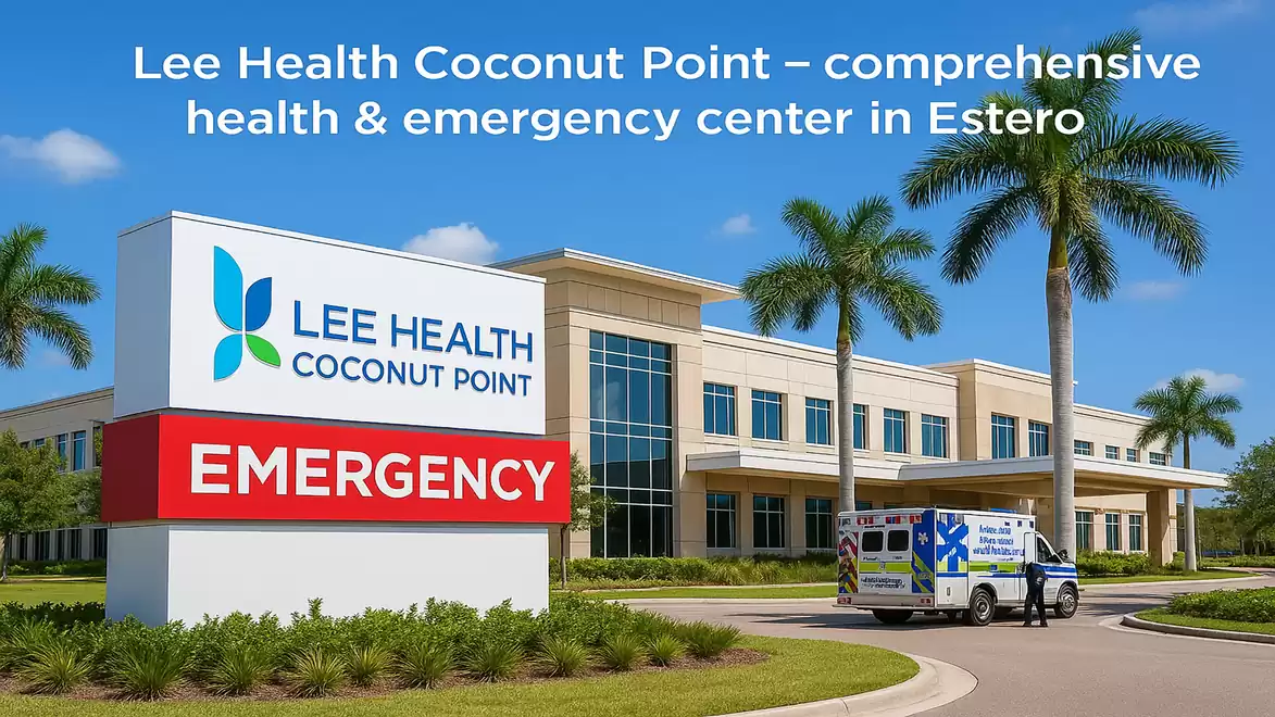Exterior view of the Lee Health Coconut Point health center in Estero, Florida, featuring an ambulance and tropical palm trees.