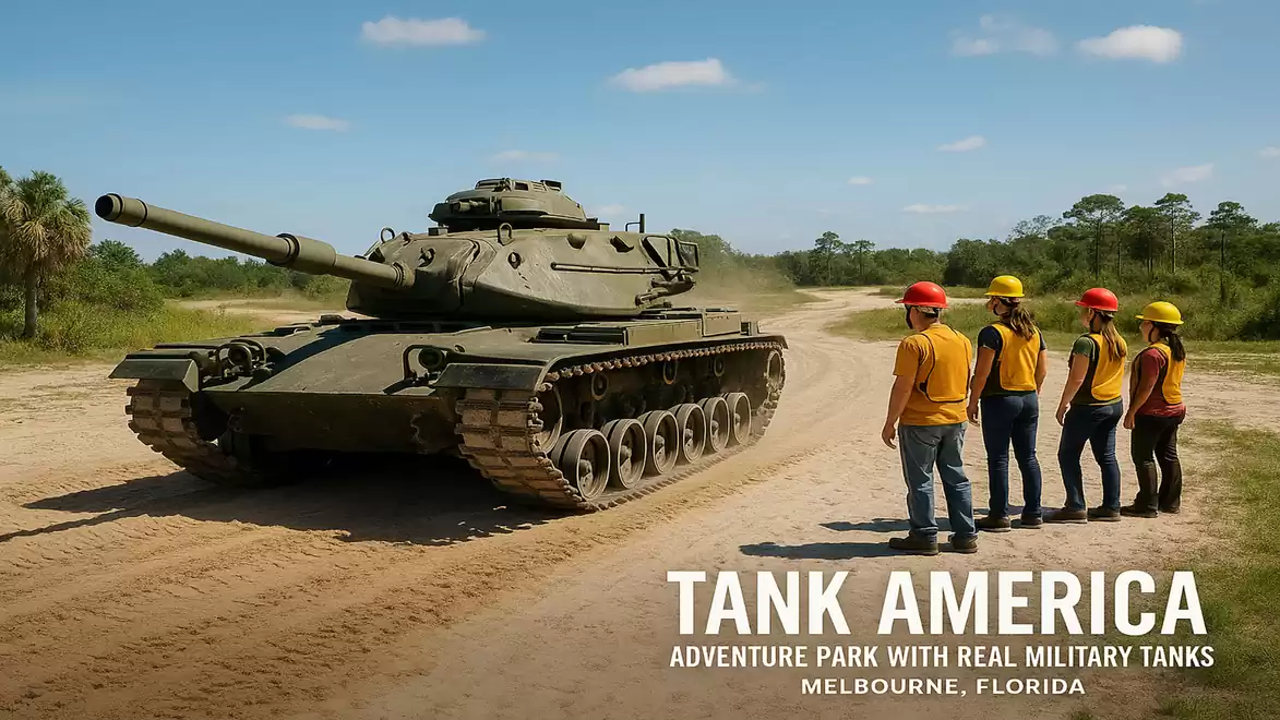 People in safety helmets watching a tank at Tank America adventure park in Melbourne, Florida.