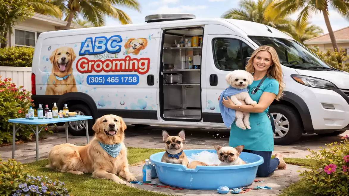 Woman with dog in front of a mobile grooming van, outdoor lawn scene with dogs being groomed.