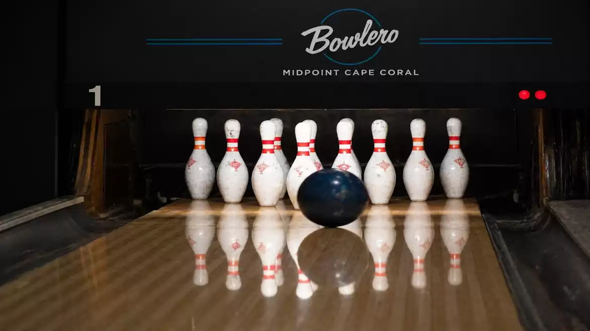 Bowling lane with ball approaching pins at Bowlero Midpoint Cape Coral.