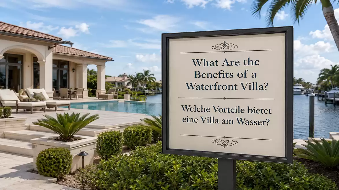 Luxurious waterfront villa with a large swimming pool and a sign listing the benefits of living in a waterfront villa.