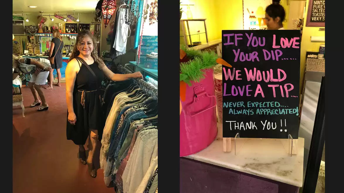 A woman in a clothing store looks at a selection of jeans. Next to her is a sign saying: 'If you love your dip... we would love a tip. Never expected... always appreciated! Thank you!!'.