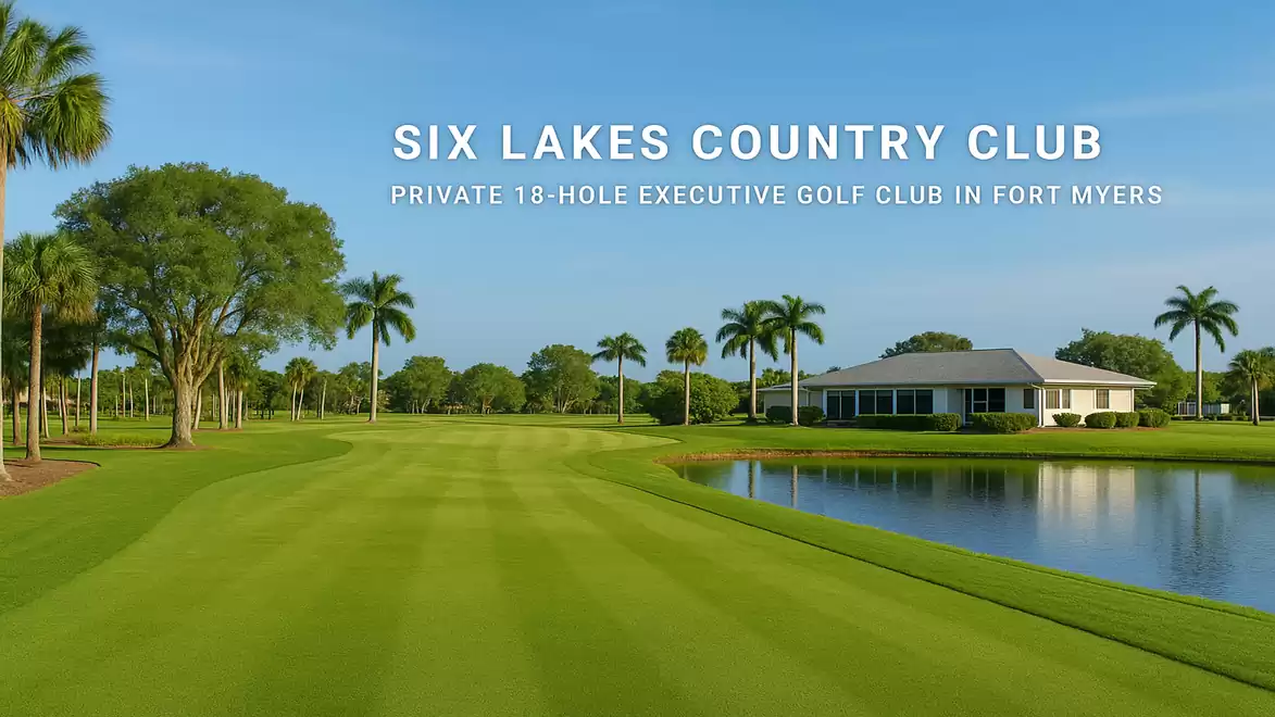 Golf course view at Six Lakes Country Club with green grass, palm trees, and a clubhouse next to a pond.