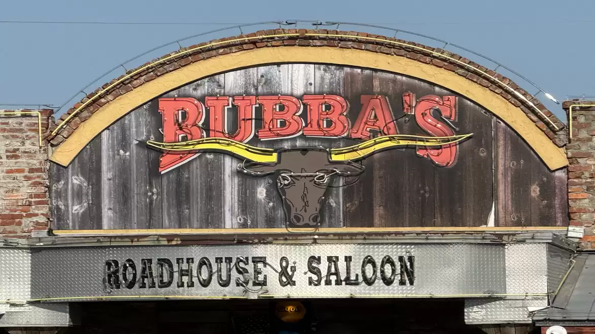 Front view of Bubba's Roadhouse & Saloon featuring a sign with bullhead design.