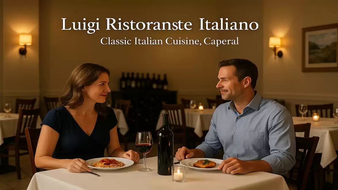 A man and a woman enjoying dinner at an Italian restaurant called Luigi Ristorante Italiano. The room is dimly lit with candlelight and elegant decor.