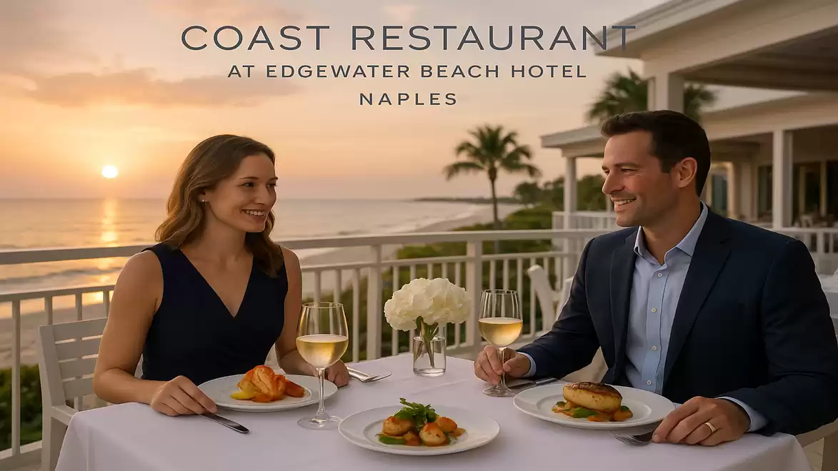A couple enjoying an elegant dinner on a restaurant terrace with ocean view at sunset.