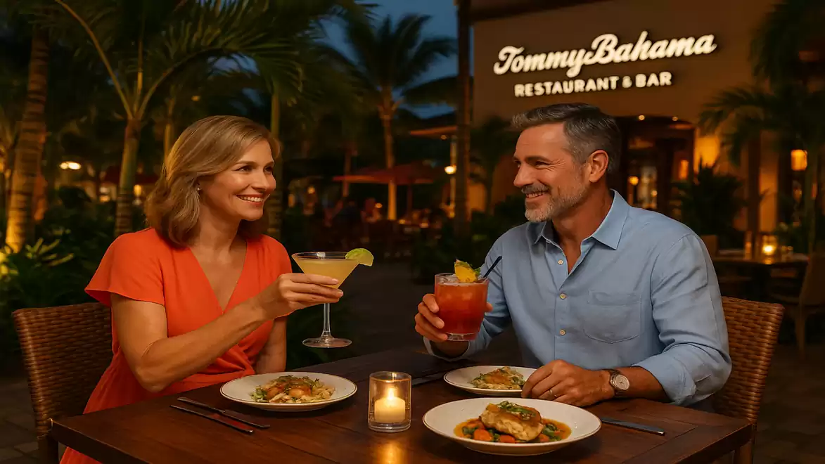 A couple enjoys dinner and cocktails at Tommy Bahama Restaurant & Bar.