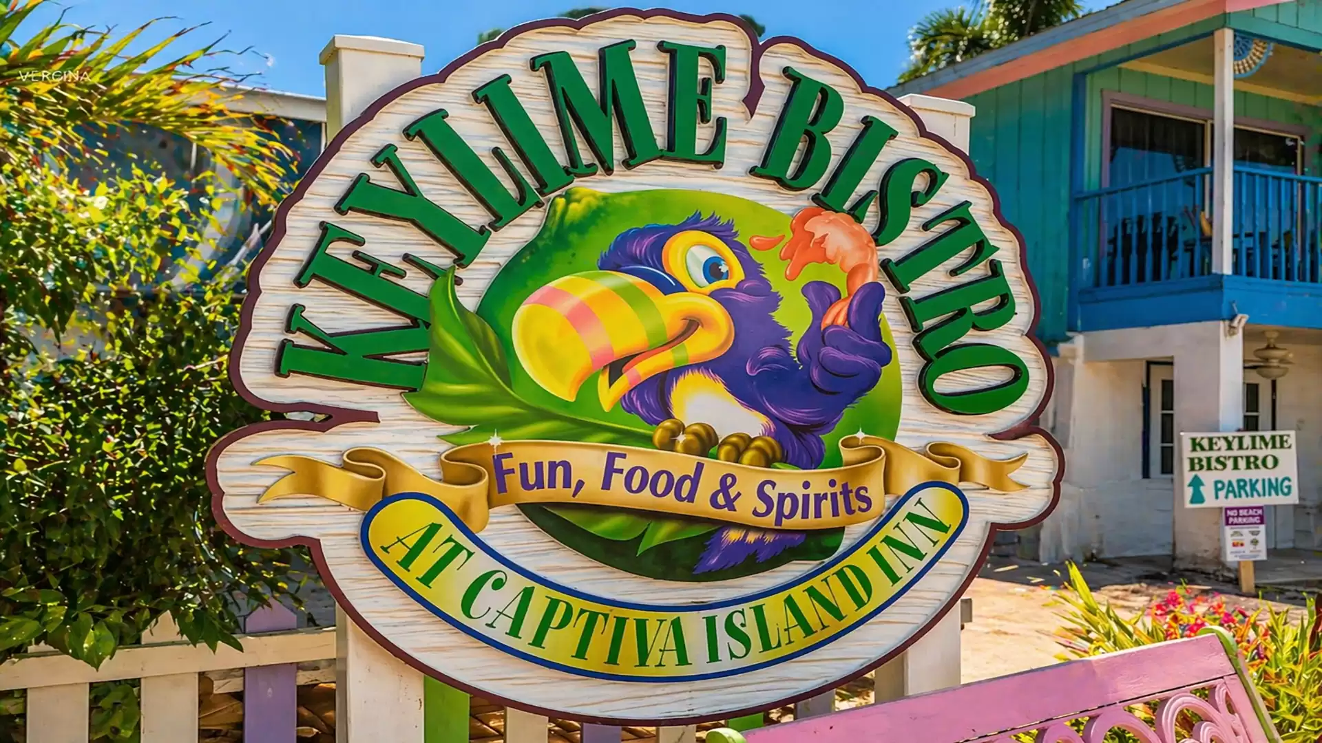 A colorful sign for 'Keylime Bistro' featuring a parrot with a lime beak, advertising food and drinks on Captiva Island.