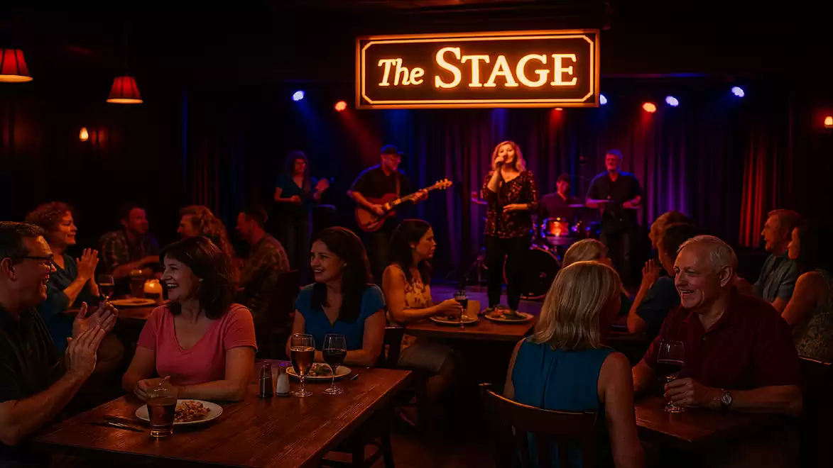 A lively music club with a live band on stage, surrounded by an engaging audience at tables.