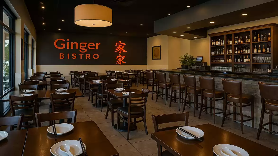 Interior view of a modern restaurant with wooden furniture, a well-stocked bar, and decorative lighting.