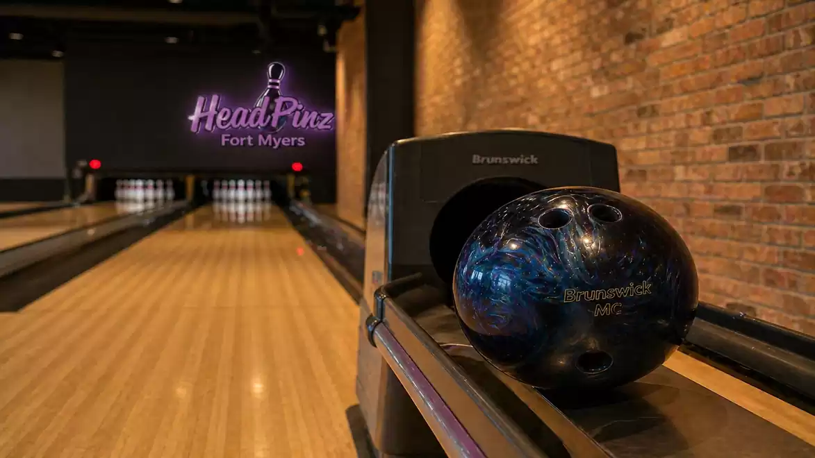 Bowling ball on a lane in a stylish bowling alley in Fort Myers.