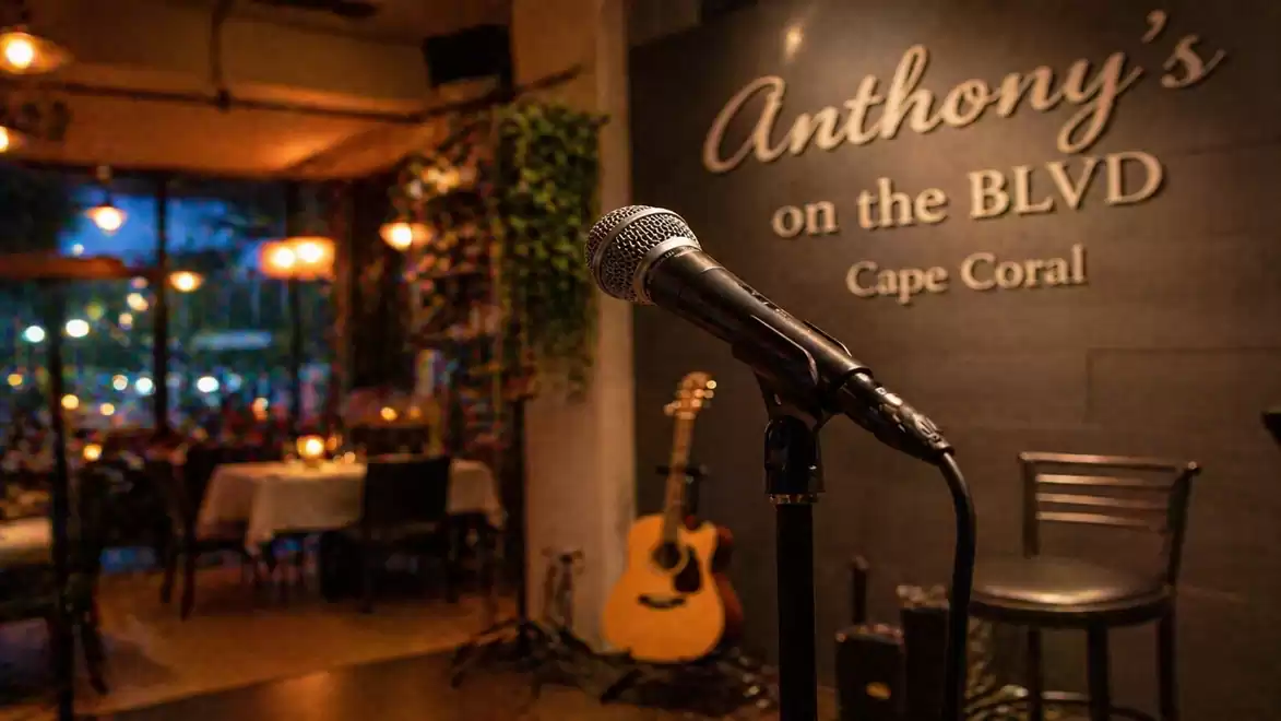 Cozy restaurant with a microphone on stage and a guitar in the background, perfect for live music evenings.