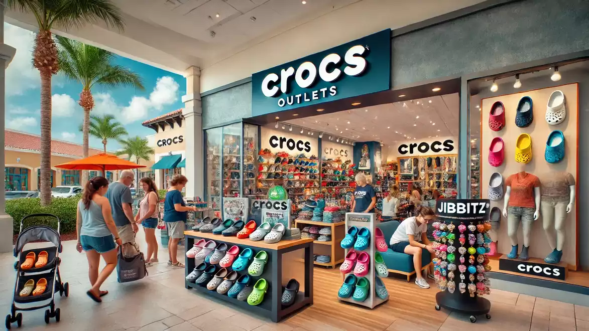 Shopping mall with Crocs outlet store, customers browsing colorful shoes.