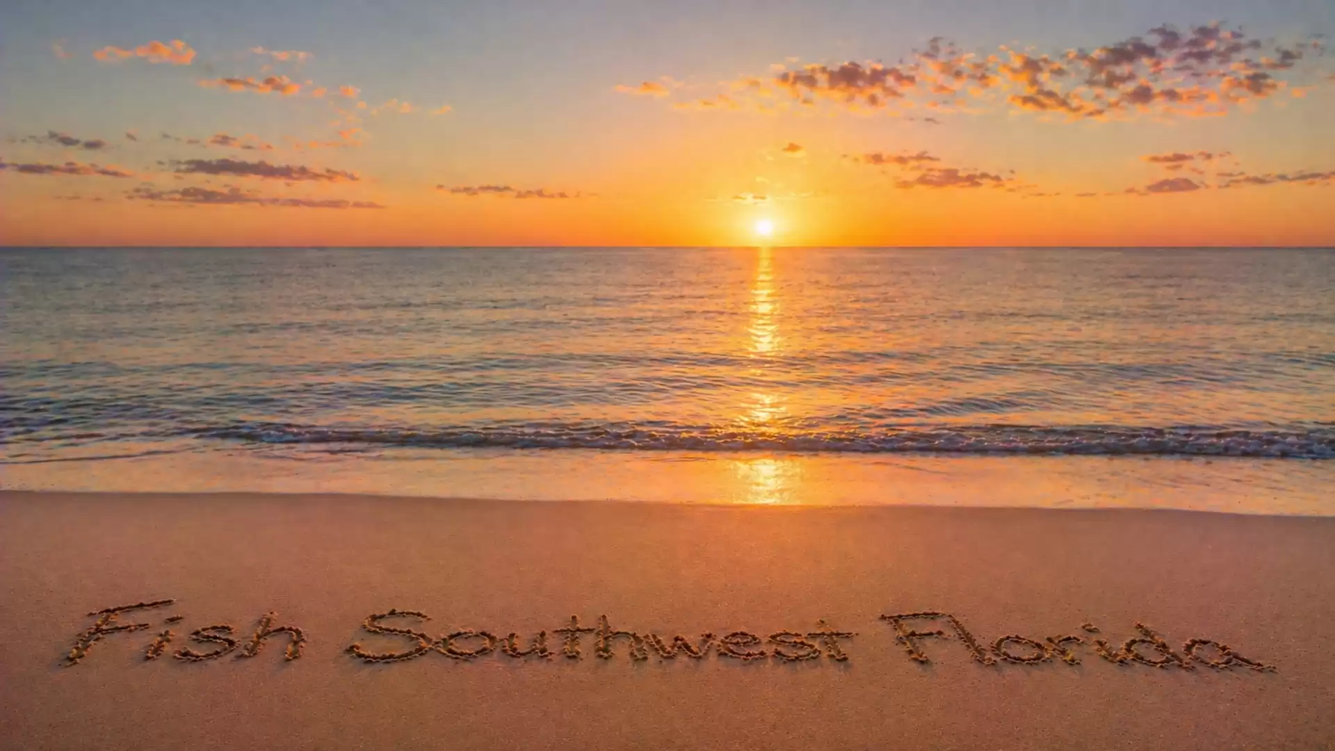Sunset on the beach with the inscription 'Fish Southwest Florida' in the sand.