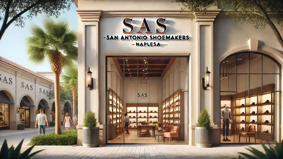 Facade of an elegant shoe store named 'San Antonio Shoemakers' with palm trees in the foreground.