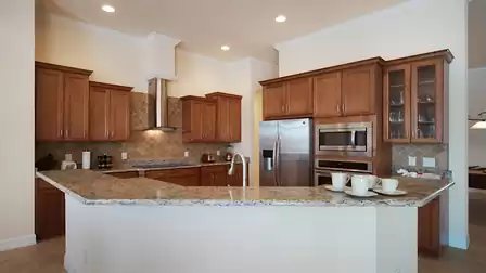 The attractive kitchen is fully equipped