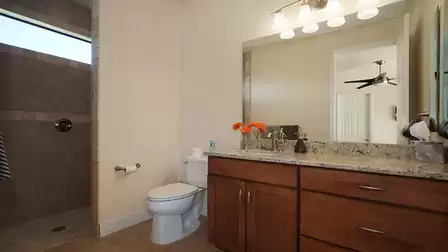 Another walk-in shower in the third bathroom