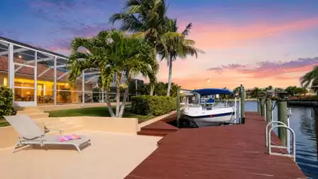 The home is located on a gulf access canal