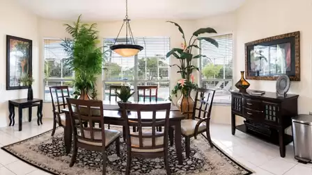 Stylish furnishings and tropical accents can be found throughout the entire home