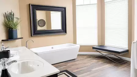 The adjacent master bath includes tub, shower, and double sinks