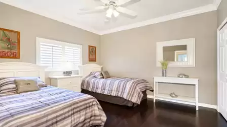 Two Twin beds are set up in the third bedroom