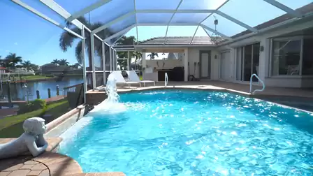 The home features a pool and spa, both of which can be electrically heated