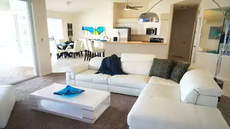 Large sliders allow plenty of light into the living room