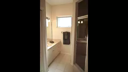 Another shower is available in the third bathroom