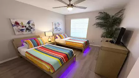 The second bedroom offers beautiful large single beds