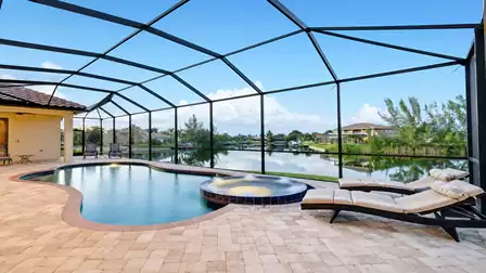 Villa Maxima Cape Coral vacation home lanai with pool, spa and canal view