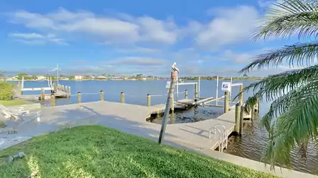 Slow down at the beautiful lake with boat dock