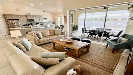 Take a seat on the comfortable leather sofas and enjoy the view of the lake