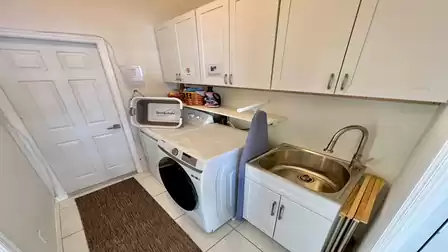 You will find a washer and dryer in the utility room